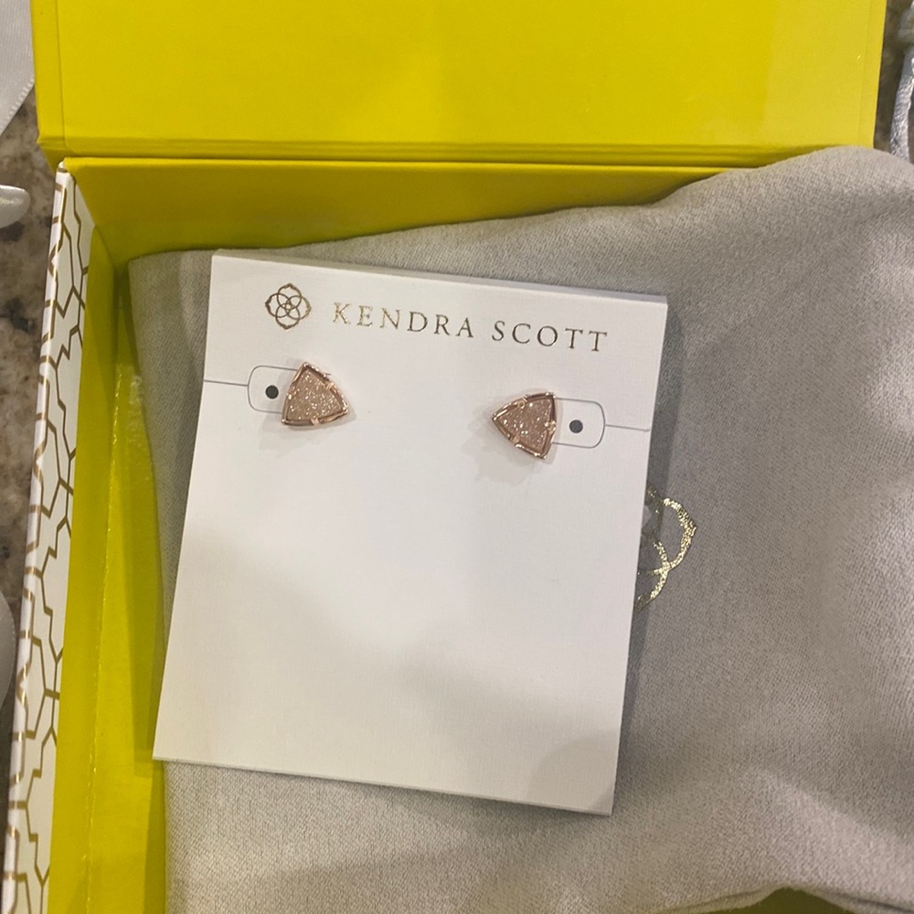 Kendra Scott earrings brand new! Rose gold studs never worn.